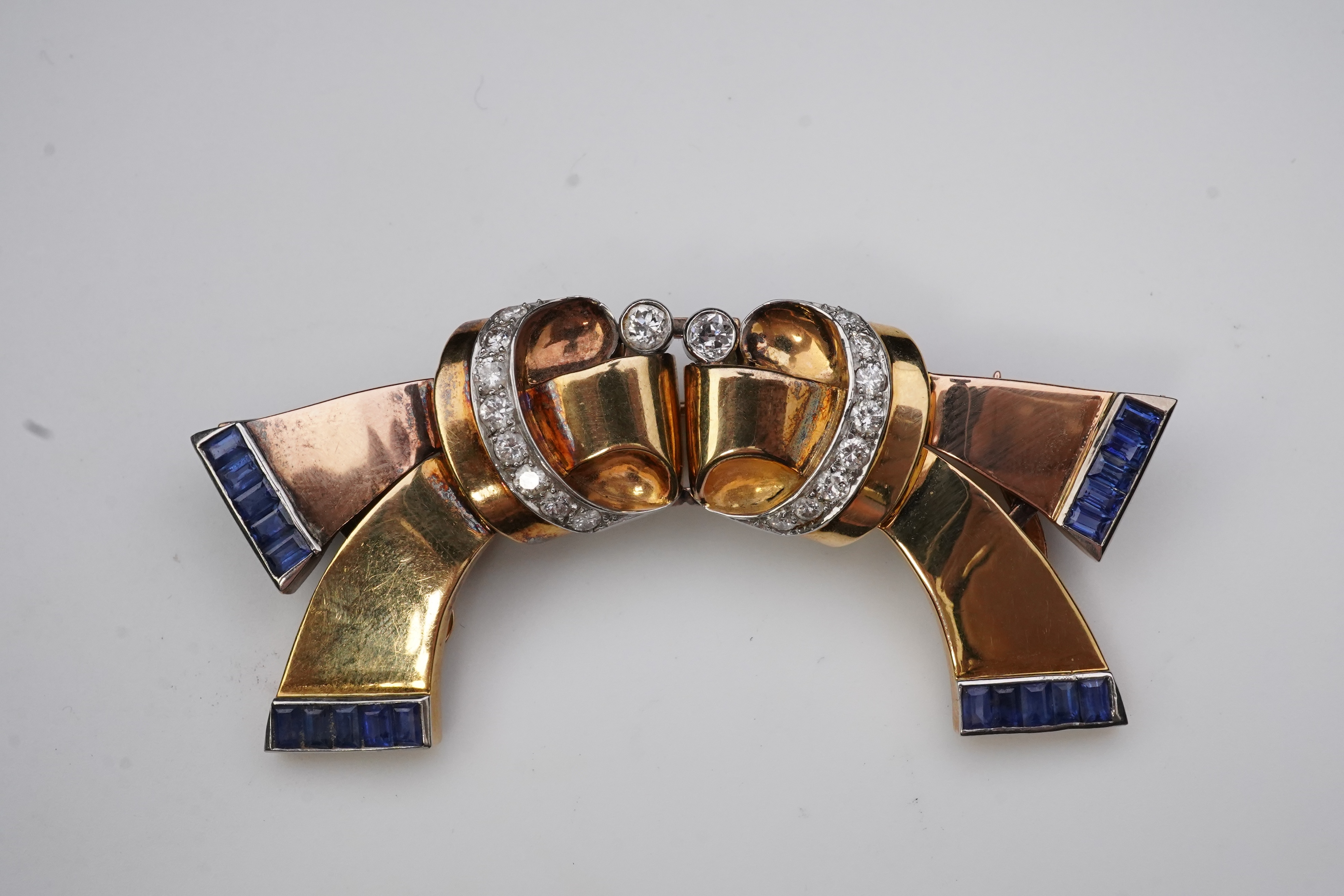 A Retro gold, sapphire and diamond double clip brooch, circa 1940